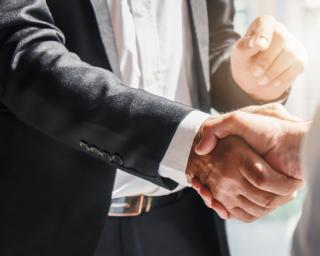 business background of businessman having handshake